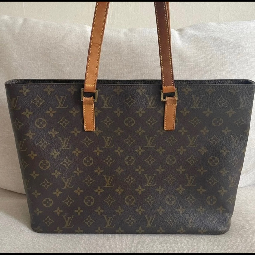 Authentic Louis Vuitton Monogram Luco Large Shoulder Bag.